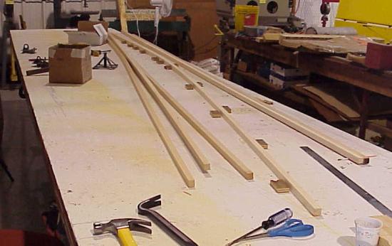 Lower longeron fitted on jig table