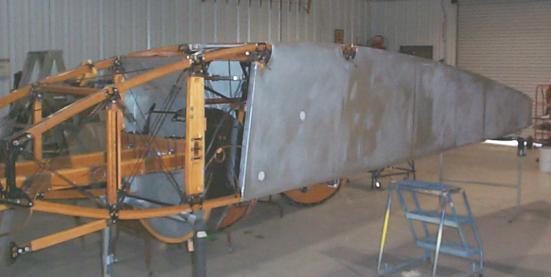 Fuselage covered to silver coat