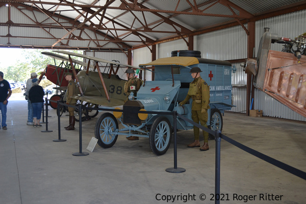 Museum hangar WWI aircraft and ambulance