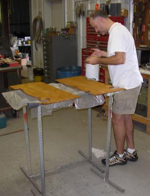 Brad varnishing the floorboards
