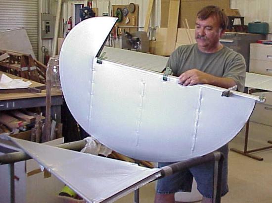 Wayne Jones preparing the rudder for painting