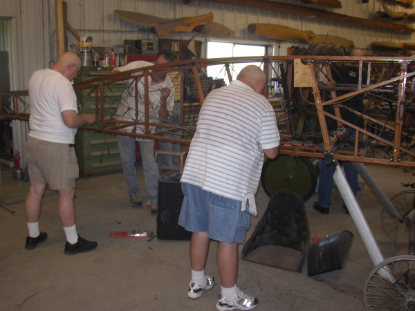 Cleaning a Thomas-Morse fuselage