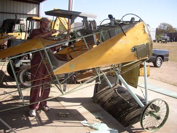 Stripping fabric from the Fokker Dr.I