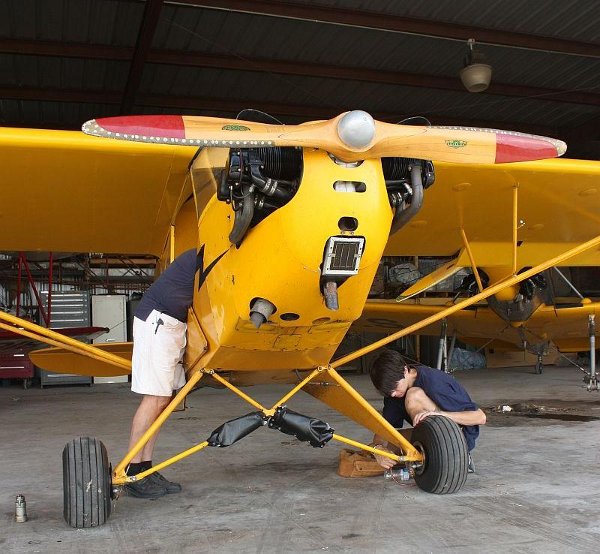 Working on the Piper Cub's side windows