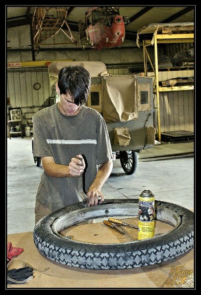 Ian Whitaker working on a Model T tire