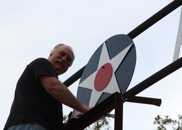 Repainting the entrance sign